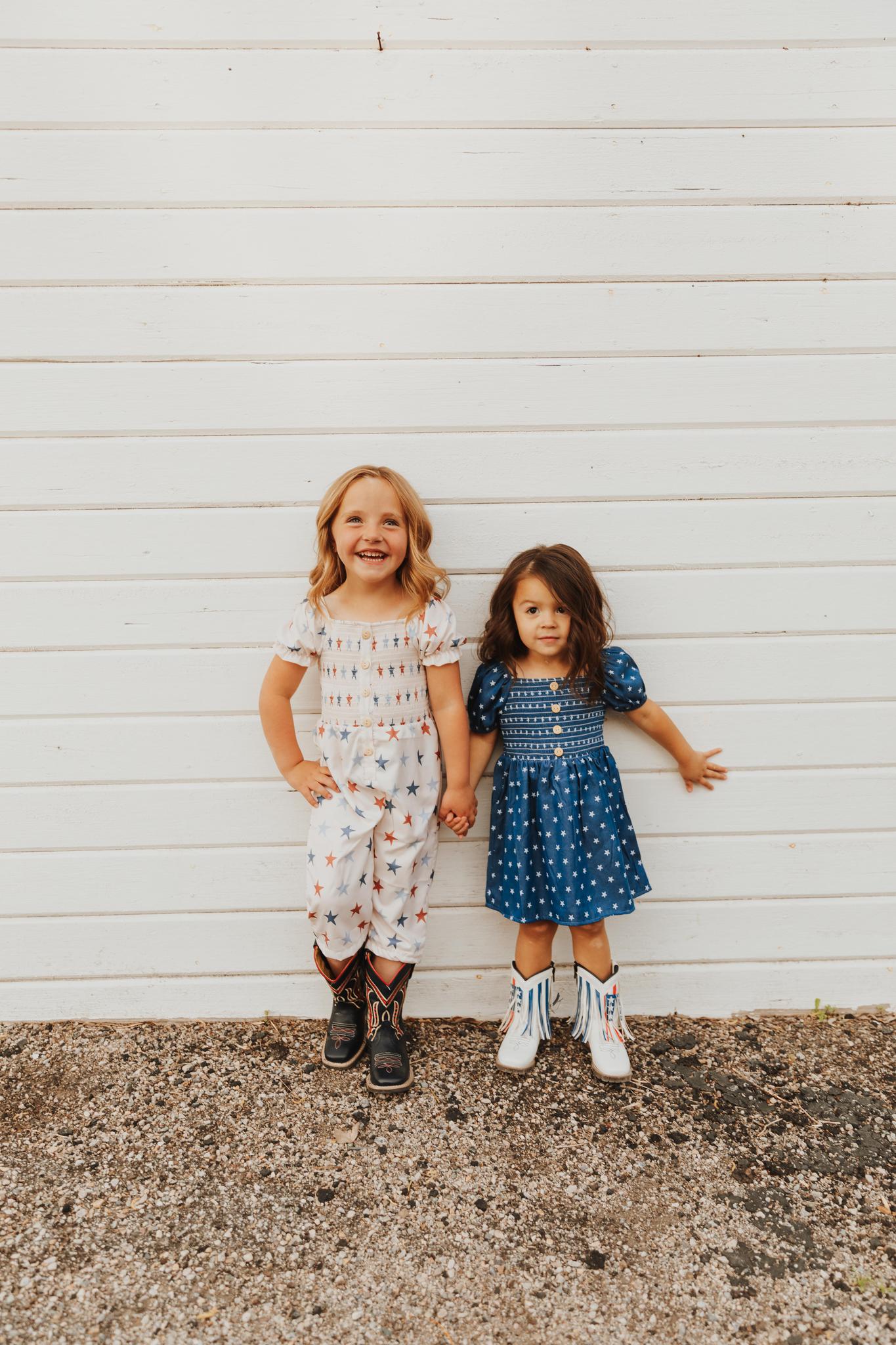 STAR PRINT SMOCKED GIRL JUMPSUIT