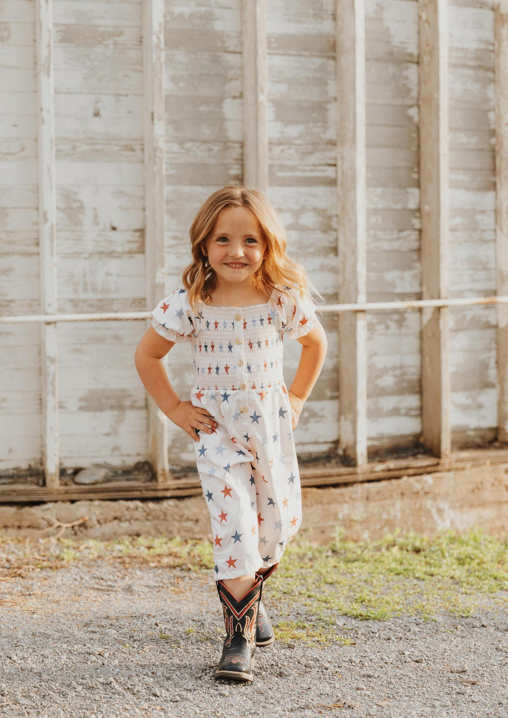 STAR PRINT SMOCKED GIRL JUMPSUIT