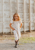 STAR PRINT SMOCKED GIRL JUMPSUIT