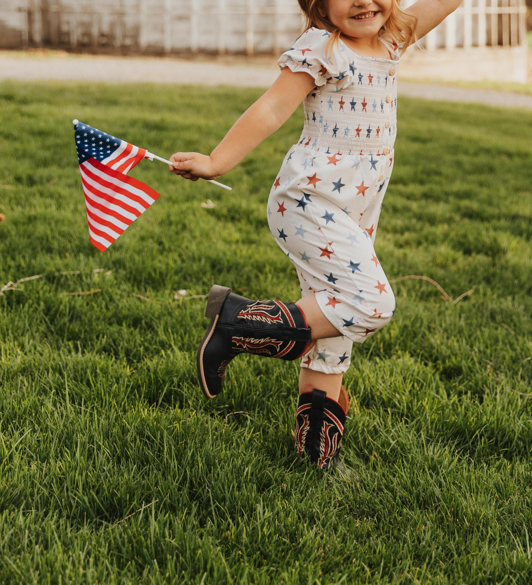 STAR PRINT SMOCKED GIRL JUMPSUIT