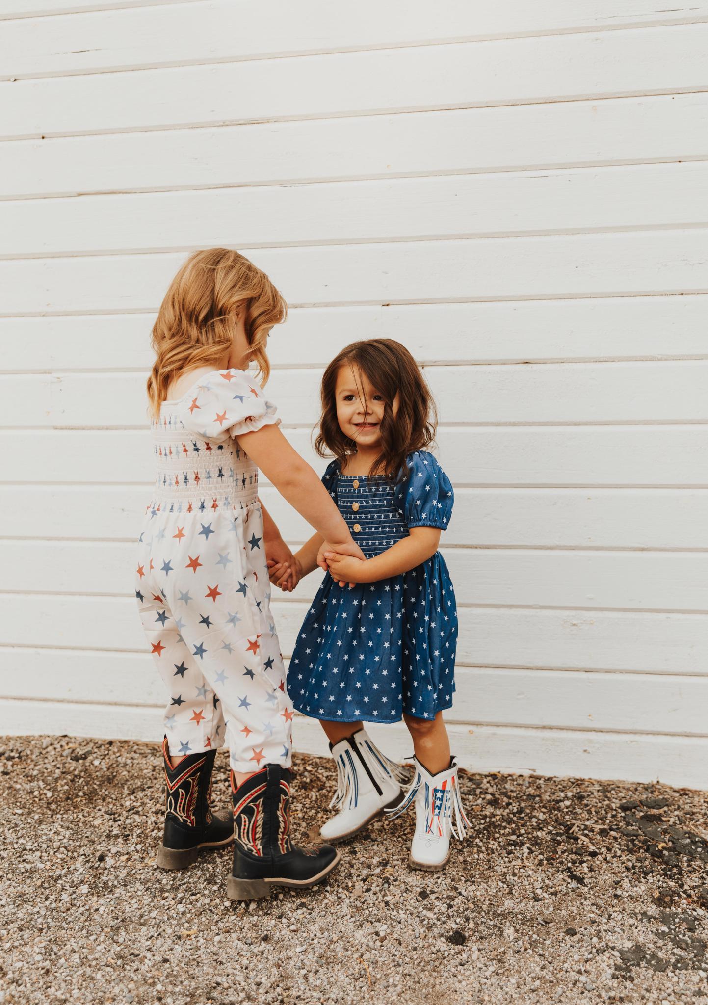 STAR PRINT SMOCKED GIRL JUMPSUIT
