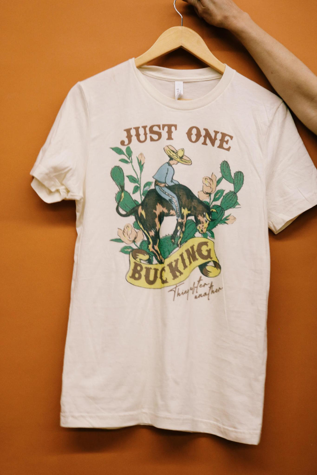 JUST ONE BUCKING THING AFTER ANOTHER GRAPHIC T SHIRT