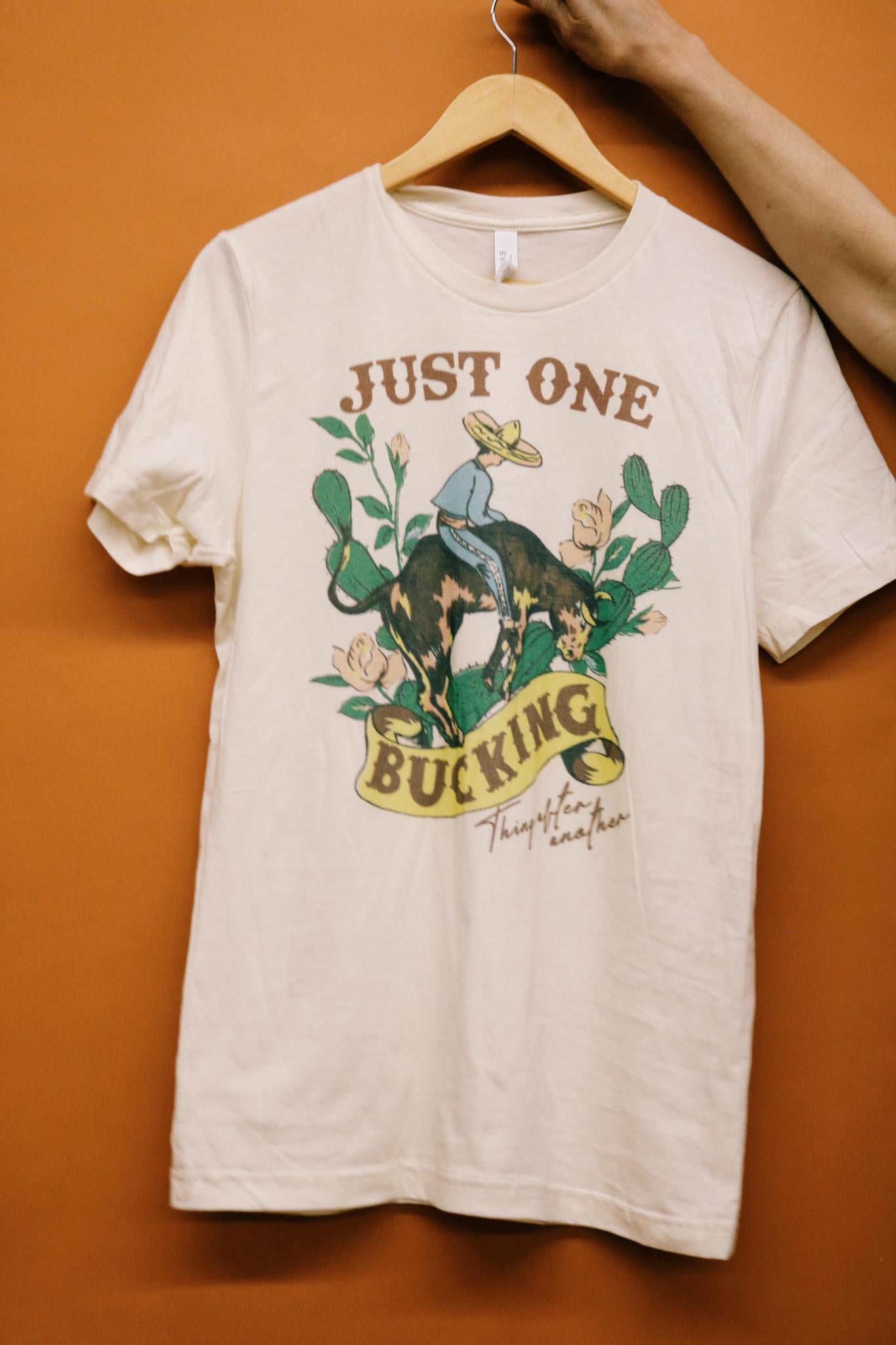 JUST ONE BUCKING THING AFTER ANOTHER GRAPHIC T SHIRT