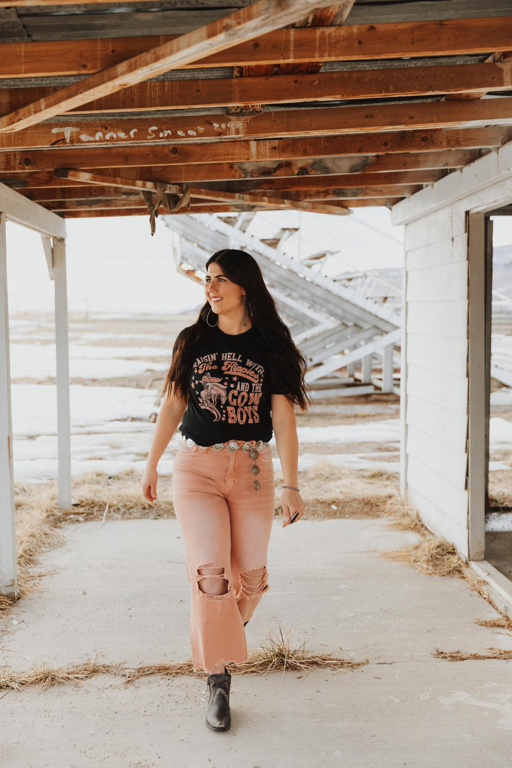 RAISIN HELL WITH THE HIPPIES & THE COWBOYS GRAPHIC TOP - BLACK