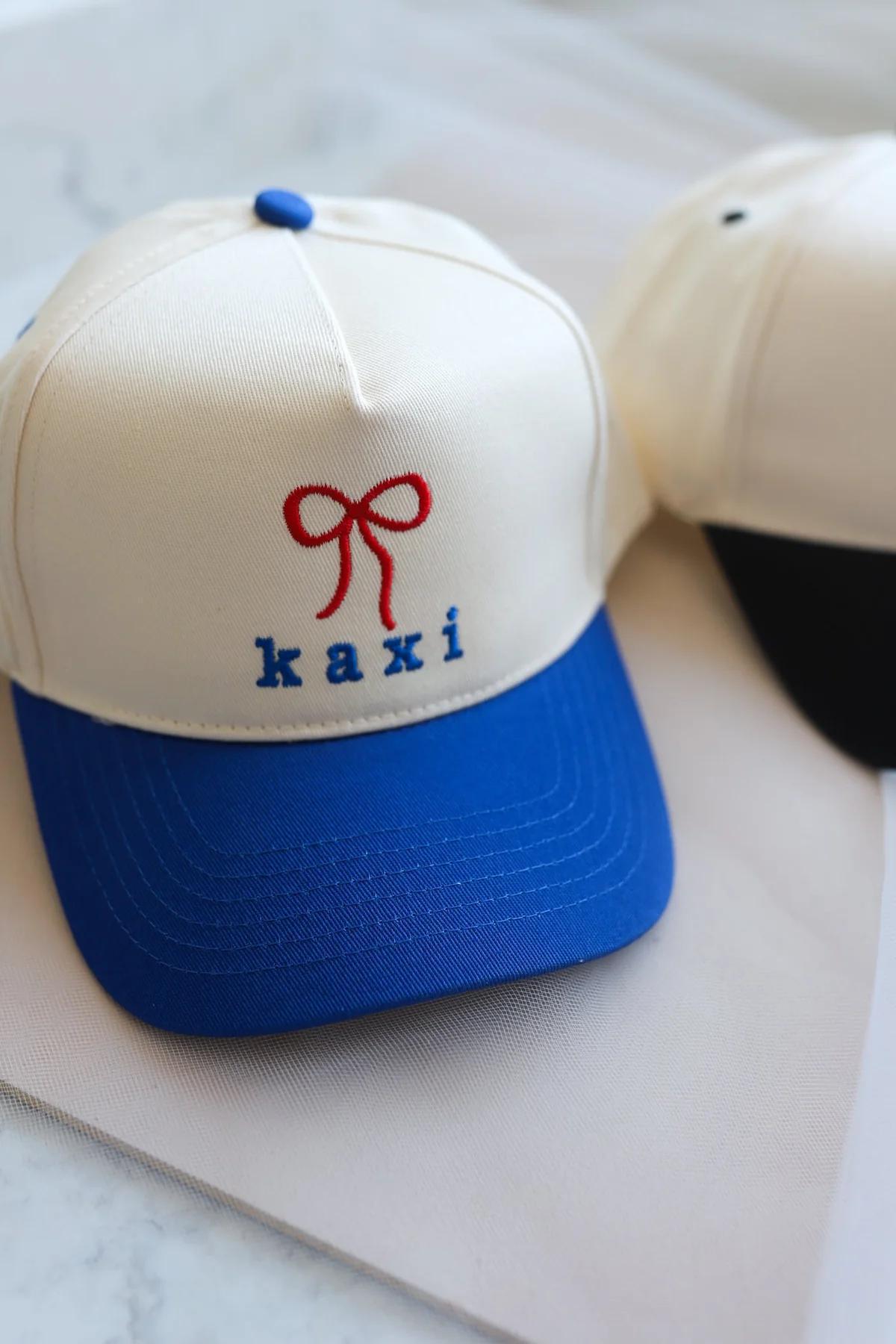 KAXI BOW TRUCKER HAT - BLUE WITH RED BOW