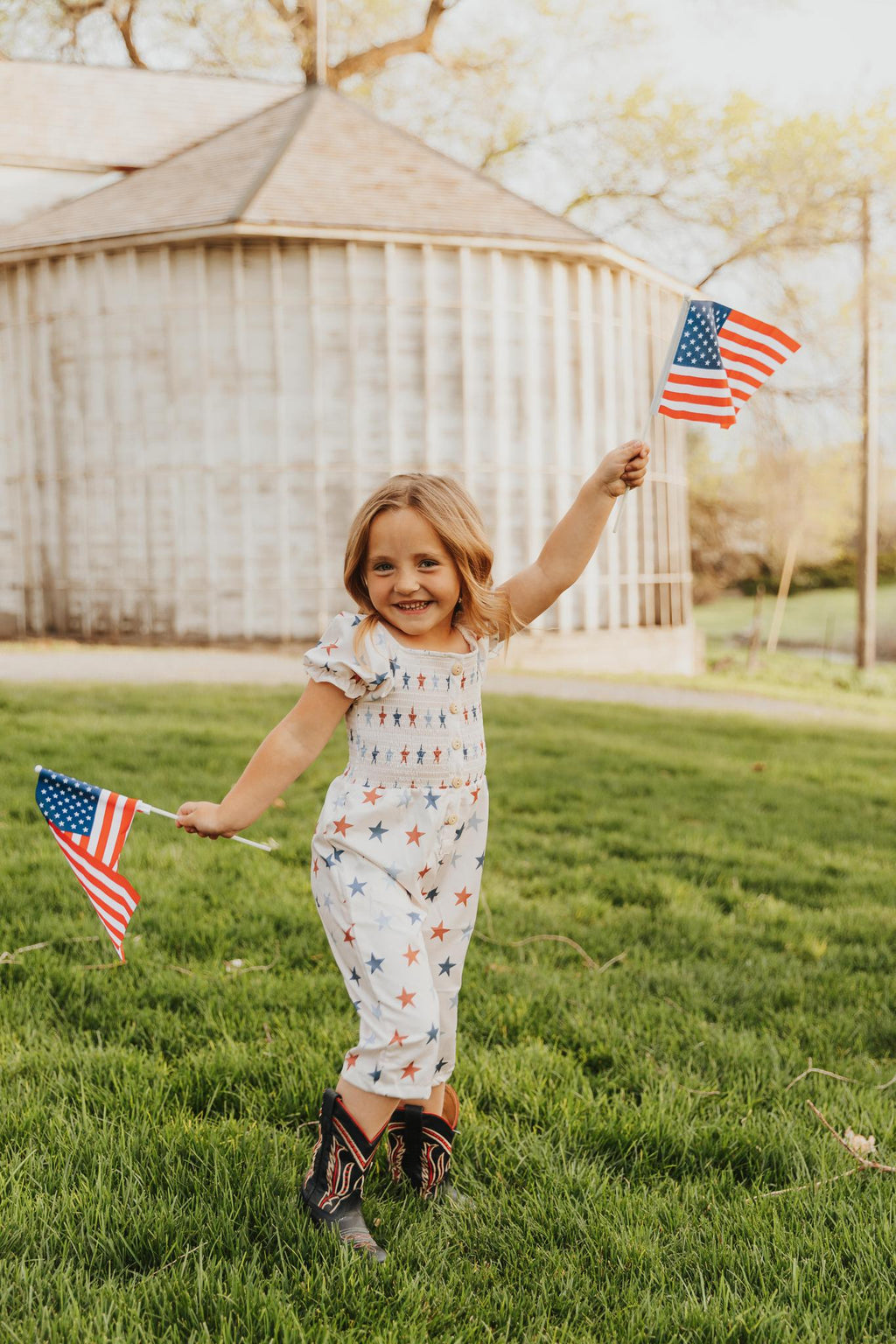 STAR PRINT SMOCKED GIRL JUMPSUIT