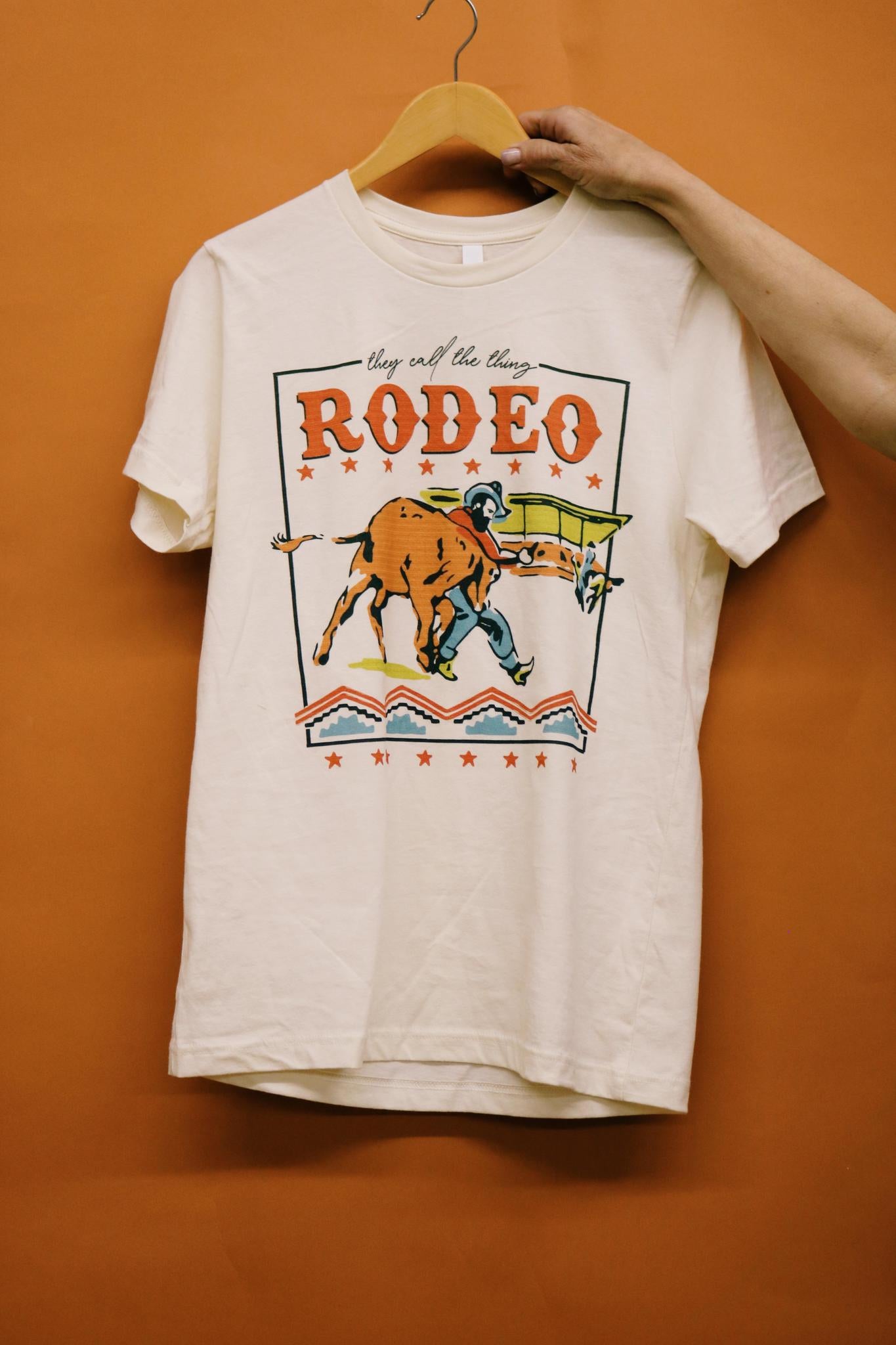 THEY CALL THE THING A RODEO GRAPHIC T SHIRT