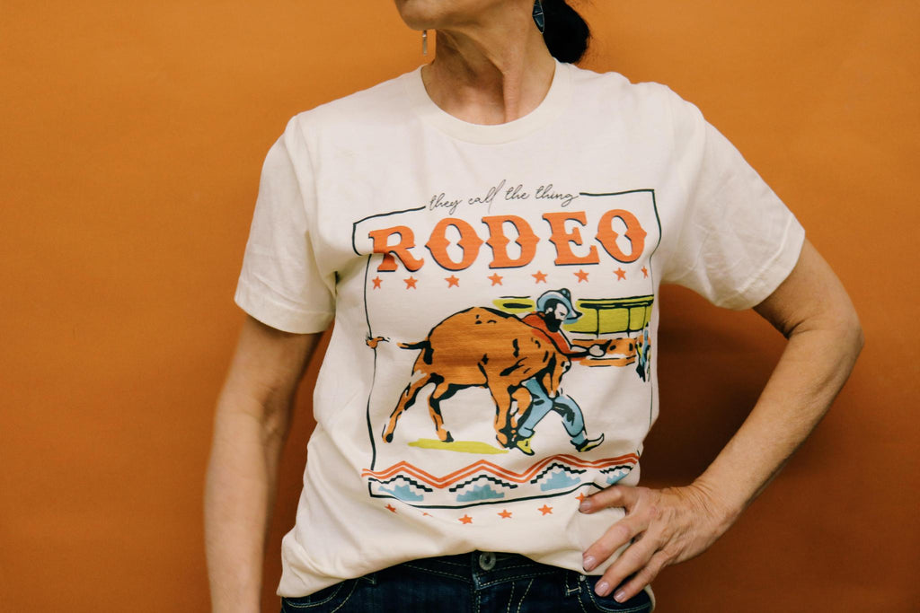 THEY CALL THE THING A RODEO GRAPHIC T SHIRT