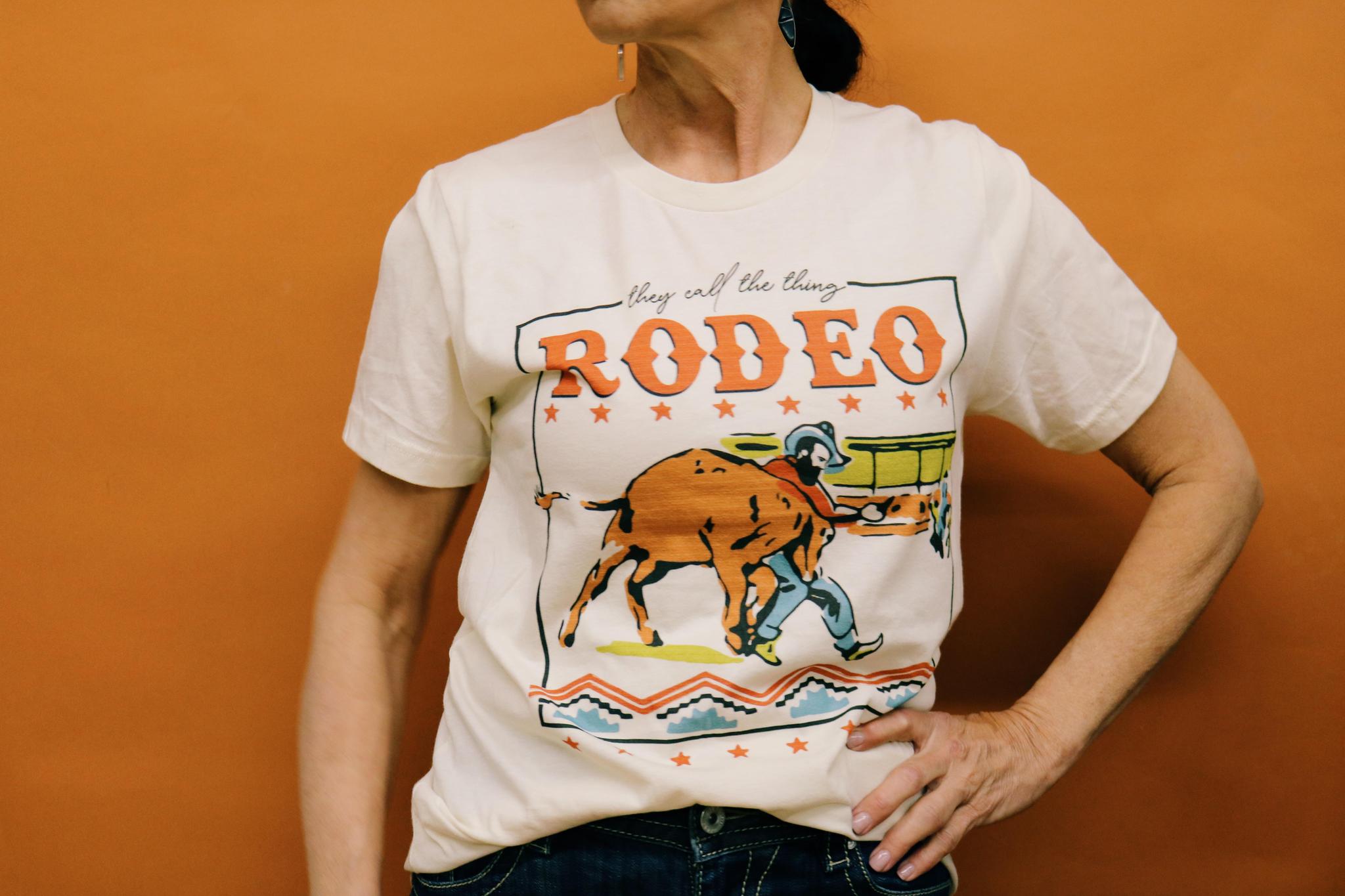 THEY CALL THE THING A RODEO GRAPHIC T SHIRT