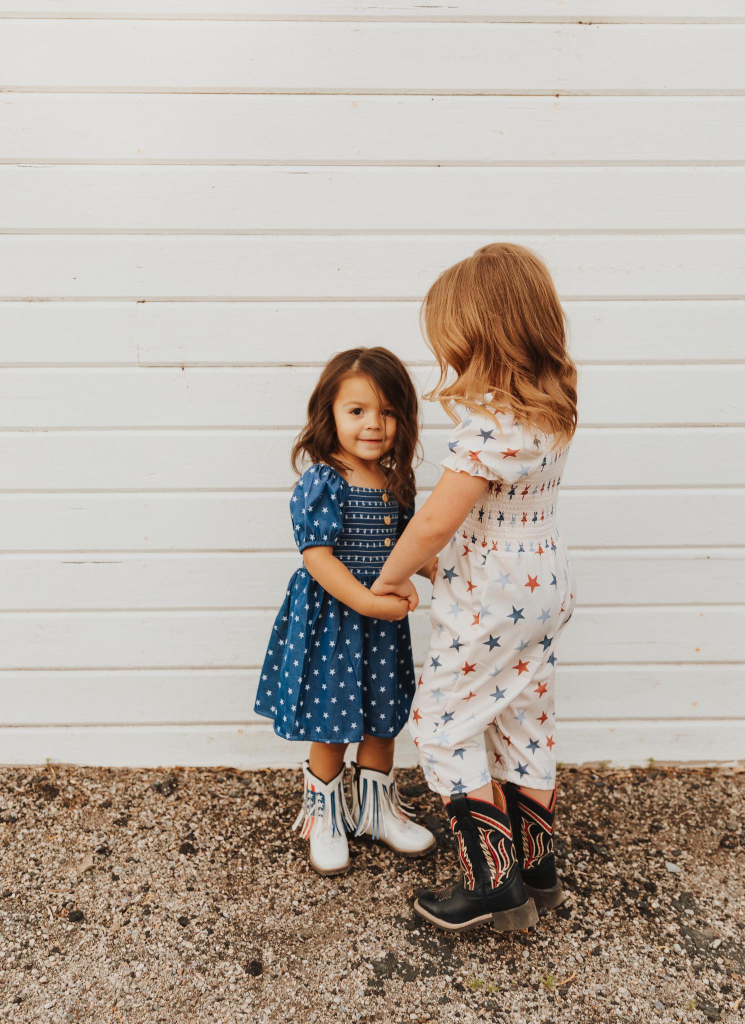 STAR PRINT SMOCKED GIRL JUMPSUIT