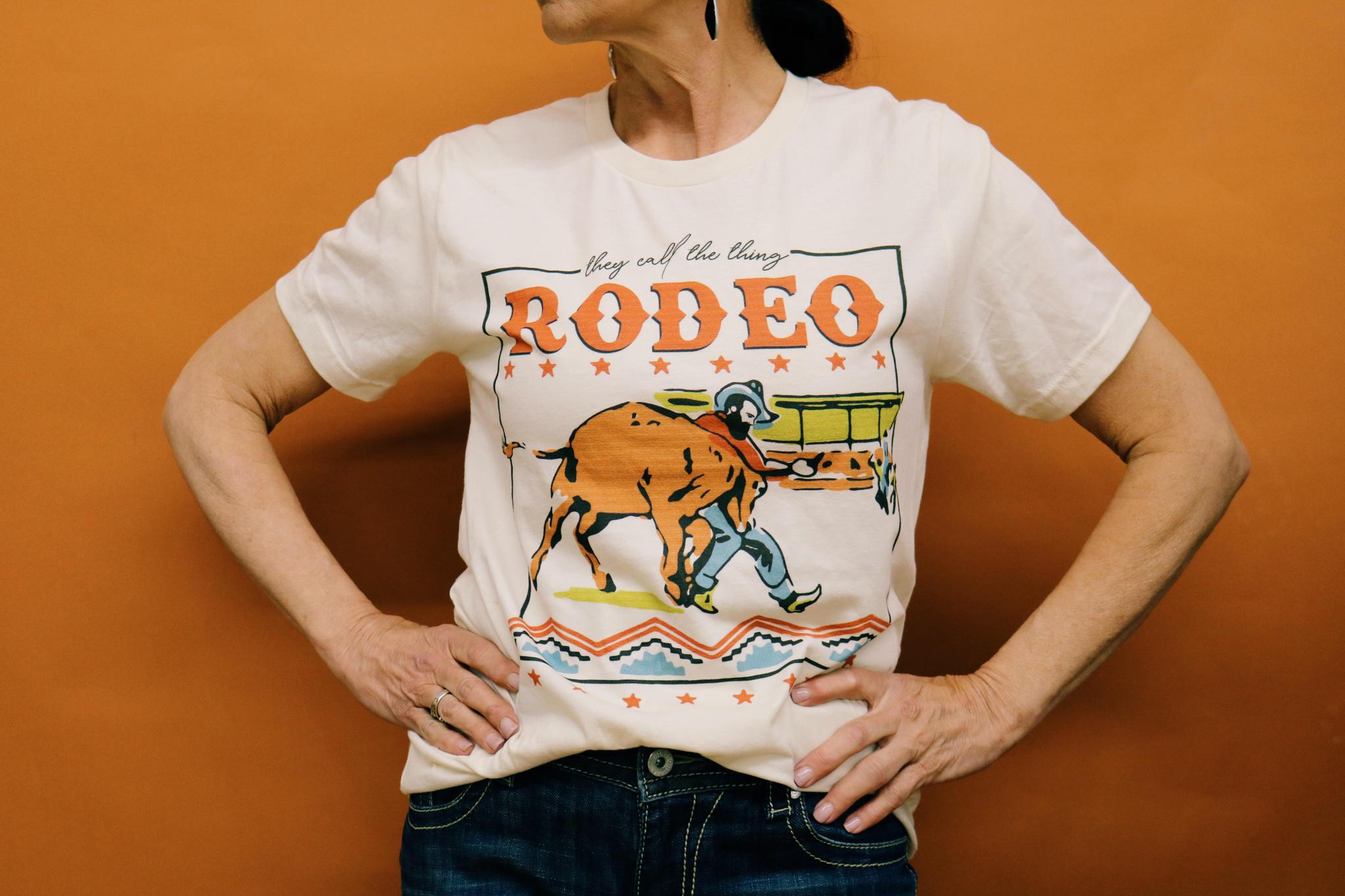THEY CALL THE THING A RODEO GRAPHIC T SHIRT