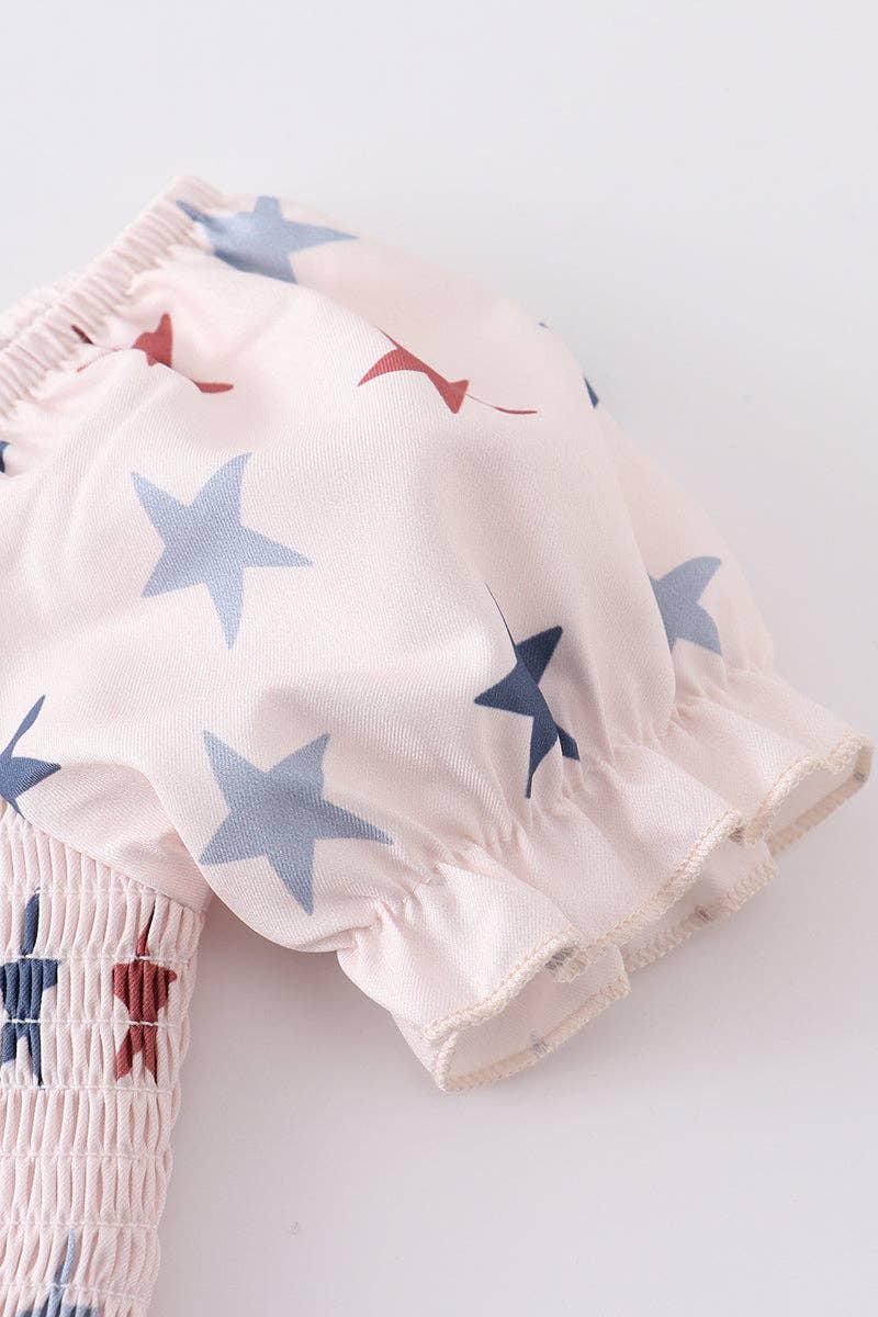 STAR PRINT SMOCKED GIRL JUMPSUIT