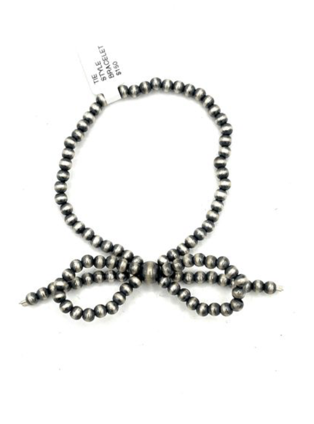 Sterling Silver Strechy Bow Tie Style Bracelet