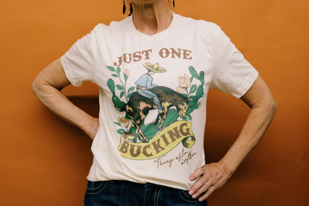 JUST ONE BUCKING THING AFTER ANOTHER GRAPHIC T SHIRT
