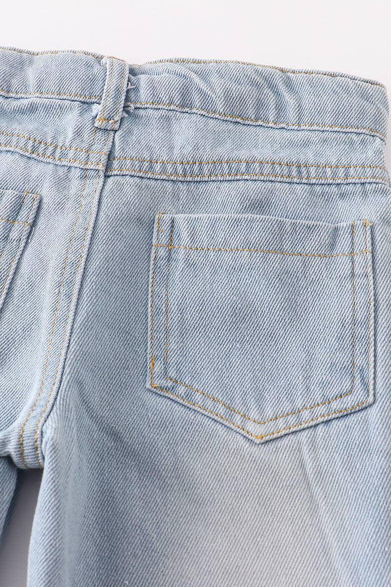 LIGHT BLUE TASSEL DENIM JEANS